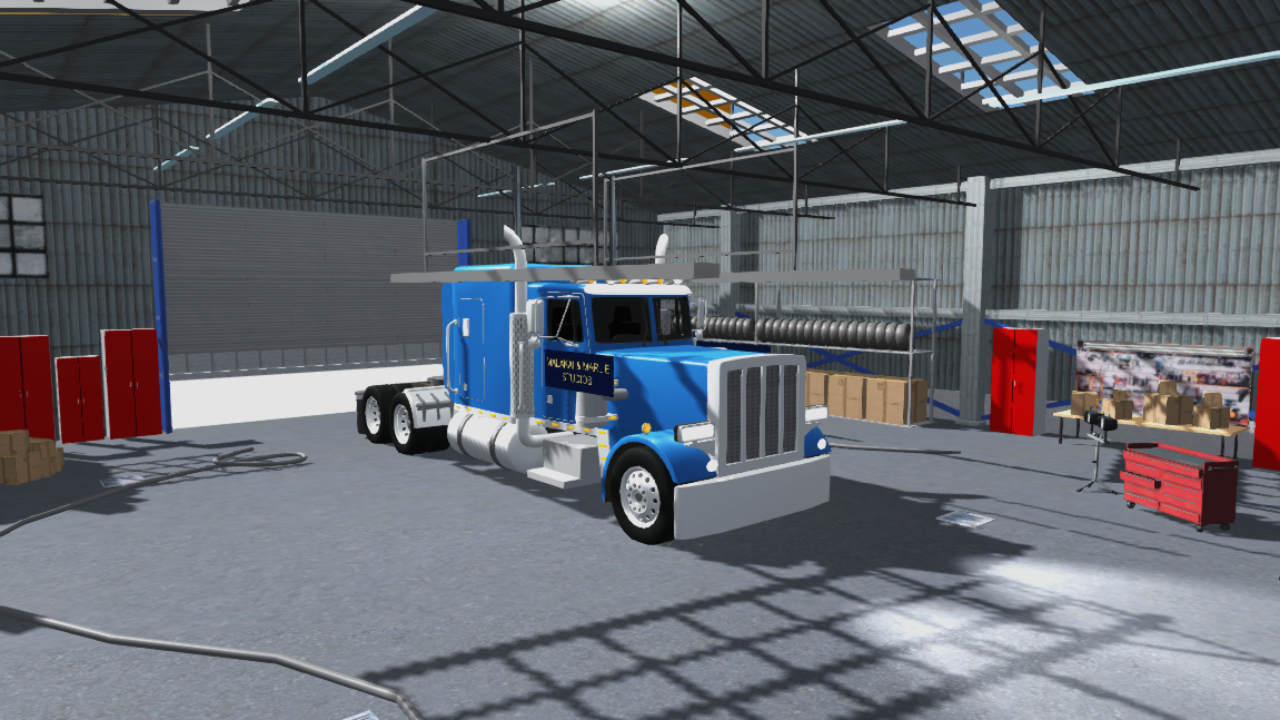 A blue Antigua Truck Run semi truck parked inside the garage